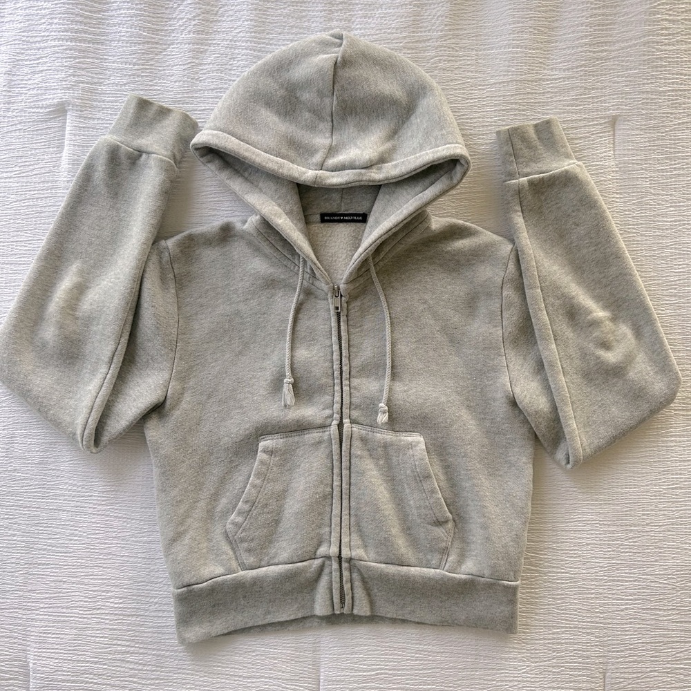Gray Brandy Melville zip-up hoodie. Size small. Gently used, great quality.